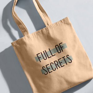 Full of Secrets Tote Bag