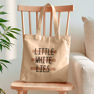 little white lies tote bag
