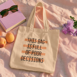 poor decisions tote bag